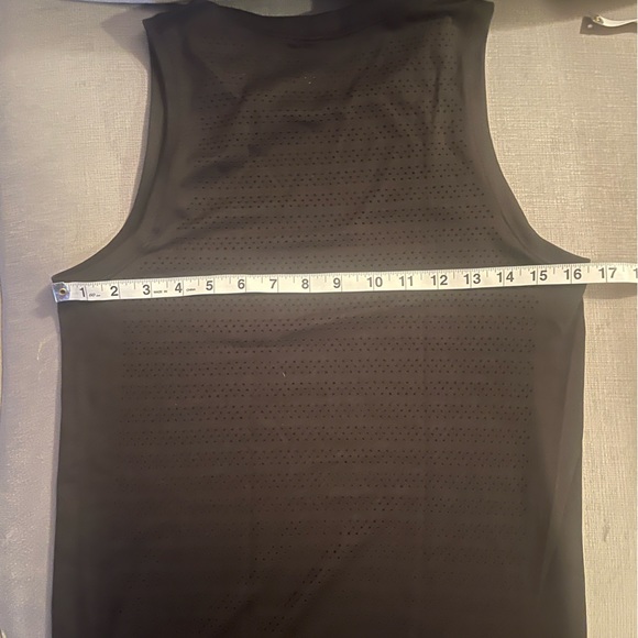 Lululemon Breeze By Muscle Tank II
Black / Black size 4 - Picture 7 of 7
